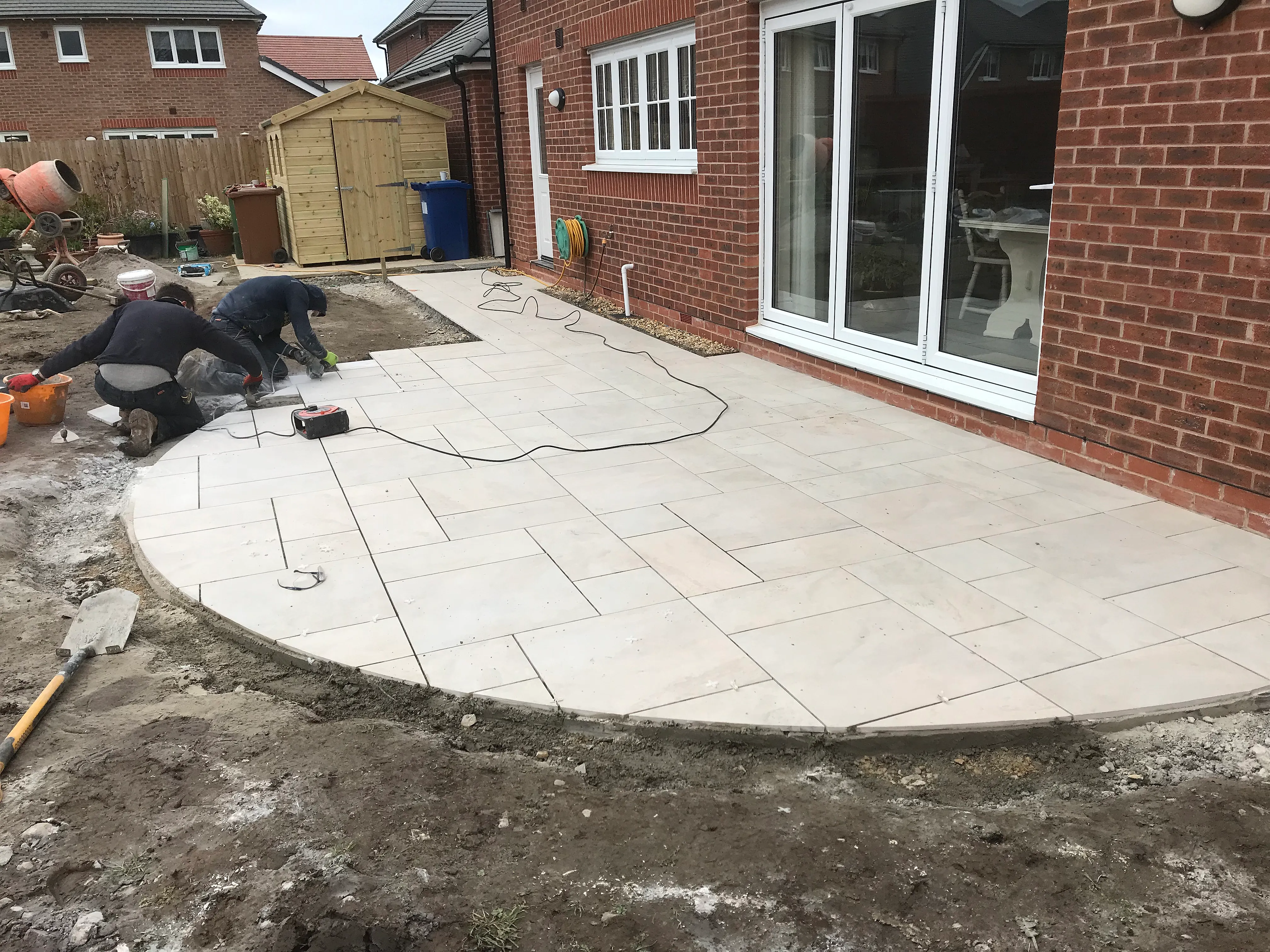 LCS Landscapes & Grounds - Porcelain patio with semi circle